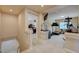 Upstairs loft area with an open doorway to a bedroom and a fully equipped home gym at 1131 Sax Fifth Ave, Henderson, NV 89052