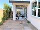 Cozy covered patio with elegant seating area, providing a serene outdoor living space at 116 Antler Square Ln, Henderson, NV 89011