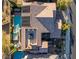 Aerial view of a beautiful home showcasing a pool, spa, and outdoor living spaces at 12249 Catanzaro Ave, Las Vegas, NV 89138