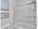 Clean bathroom with bathtub and shower, encased in a clear glass enclosure at 12249 Catanzaro Ave, Las Vegas, NV 89138