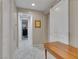 Hallway with stone floors, leading into a bedroom, with barn door on the right at 12249 Catanzaro Ave, Las Vegas, NV 89138