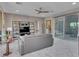 Comfortable living room featuring a ceiling fan, and views of the outdoor space at 12249 Catanzaro Ave, Las Vegas, NV 89138