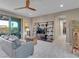 Cozy living room with large windows, stylish furniture, and modern decor at 12249 Catanzaro Ave, Las Vegas, NV 89138