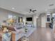 Bright living room with mountain views, comfortable seating, and access to the outdoors at 12249 Catanzaro Ave, Las Vegas, NV 89138