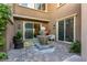 Charming courtyard featuring a decorative fountain and outdoor seating at 12249 Catanzaro Ave, Las Vegas, NV 89138