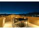 Rooftop patio featuring a table and chairs, perfect for enjoying the outdoors at 12249 Catanzaro Ave, Las Vegas, NV 89138