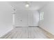 Bright bedroom with hardwood floors, ceiling fan, and a window offering natural light at 1225 S 15Th St, Las Vegas, NV 89104