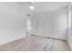 Bright bedroom features hardwood floors, a ceiling fan, and plenty of natural light at 1225 S 15Th St, Las Vegas, NV 89104