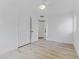 A bright bedroom with hardwood floors and a closet at 1225 S 15Th St, Las Vegas, NV 89104