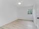 A bright bedroom with hardwood floors and a window at 1225 S 15Th St, Las Vegas, NV 89104