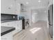 Bright kitchen featuring white cabinets, stainless steel appliances, and modern finishes at 1225 S 15Th St, Las Vegas, NV 89104