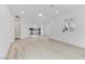 Bright and airy living room featuring modern floors and an open layout to the kitchen at 1225 S 15Th St, Las Vegas, NV 89104