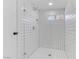 All white tiled shower with a window at 1225 S 15Th St, Las Vegas, NV 89104