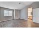 Bedroom with vaulted ceilings, vinyl floors, and an en suite bathroom at 1660 Cloister Ave, Henderson, NV 89014