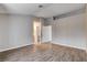 Bedroom with gray walls, modern vinyl flooring, and doorways at 1660 Cloister Ave, Henderson, NV 89014