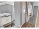 Hallway with hardwood floors, leading to other rooms with a staircase at 1660 Cloister Ave, Henderson, NV 89014