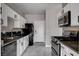 Well-equipped kitchen featuring sleek appliances and granite countertops at 1660 Cloister Ave, Henderson, NV 89014