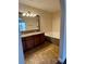 Bathroom featuring tile flooring, granite counter tops, and a soaking tub at 1858 N Decatur Blvd # 204, Las Vegas, NV 89108