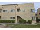 Apartment building with well-maintained landscaping and visible unit entrances at 1858 N Decatur Blvd # 204, Las Vegas, NV 89108