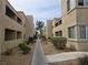 Exterior view of apartment building with green landscape at 1858 N Decatur Blvd # 204, Las Vegas, NV 89108