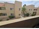 Exterior view of the apartment building, showing balconies at 1858 N Decatur Blvd # 204, Las Vegas, NV 89108