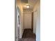Hallway featuring carpet flooring and multiple doors at 1858 N Decatur Blvd # 204, Las Vegas, NV 89108