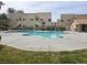 Sparkling community pool enveloped by lush greenery, providing a refreshing oasis within the complex at 1858 N Decatur Blvd # 204, Las Vegas, NV 89108