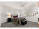 Bedroom featuring neutral decor, a ceiling fan, and a comfortable bed with matching furnishings at 2037 Summer Blossom Ct # 101, Las Vegas, NV 89134