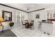 Bright eat-in kitchen with white cabinets, black countertops and lots of natural light at 2037 Summer Blossom Ct # 101, Las Vegas, NV 89134
