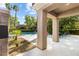 View of the community pool with seating, palm trees and lush landscaping around the pool at 2037 Summer Blossom Ct # 101, Las Vegas, NV 89134