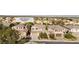 Aerial view of a two-story home at 235 Desert Arroyo Ct. with a well-manicured front yard at 235 Desert Arroyo Ct, Henderson, NV 89012