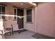 Inviting front porch featuring decorative accents and comfortable seating area at 235 Desert Arroyo Ct, Henderson, NV 89012