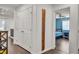 Hallway with bedroom and closet views; featuring a decorative height measuring ruler on the wall at 235 Desert Arroyo Ct, Henderson, NV 89012