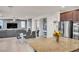 Open-concept kitchen and dining area with views of the living room at 235 Desert Arroyo Ct, Henderson, NV 89012