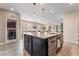 Beautiful kitchen island featuring stainless steel appliances and a deep sink at 2422 Fasano St, Henderson, NV 89044