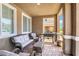 Inviting covered patio with comfortable seating and a grill for outdoor cooking at 2422 Fasano St, Henderson, NV 89044