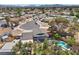Aerial view of a home with a pool, showcasing the layout within a residential neighborhood at 2447 Tournament St, Las Vegas, NV 89142
