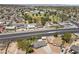The aerial view of the property reveals its location near a park and major thoroughfare, adding convenience at 2447 Tournament St, Las Vegas, NV 89142