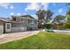Spacious backyard with well-maintained lawn, patio, and inviting swimming pool at 2447 Tournament St, Las Vegas, NV 89142