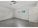 Neutrally decorated bonus room with a window view at 2447 Tournament St, Las Vegas, NV 89142