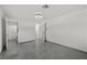 Open bonus room with tiled floors with easy access to the laundry room at 2447 Tournament St, Las Vegas, NV 89142