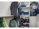 Organized closet with clothes, hats, and storage boxes for optimal storage and organization at 2447 Tournament St, Las Vegas, NV 89142