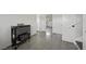 Clean, bright hallway with tiled floors and multiple doorways leading to other rooms at 2447 Tournament St, Las Vegas, NV 89142