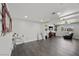 Spacious living room featuring hardwood floors and bright, natural light at 2447 Tournament St, Las Vegas, NV 89142