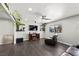 Modern living room with sleek flooring, contemporary decor, and stylish furniture arrangement at 2447 Tournament St, Las Vegas, NV 89142