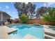 Sparkling swimming pool with integrated spa and patio, set in a private backyard setting at 2447 Tournament St, Las Vegas, NV 89142