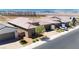 Overhead view showcasing a neighborhood with desert landscaping, tile roofs, and mountain views at 2719 Canvas Sky St, Henderson, NV 89044