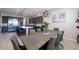 Bright dining room area with a view into the kitchen and backyard at 2719 Canvas Sky St, Henderson, NV 89044