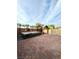 Inviting backyard featuring a hot tub, brick pavers, and a pergola with string lights for evening enjoyment at 2922 Tranquil Brook Ave, Henderson, NV 89044
