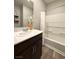 Clean bathroom featuring a vanity with a sink and a combined shower and tub at 2922 Tranquil Brook Ave, Henderson, NV 89044